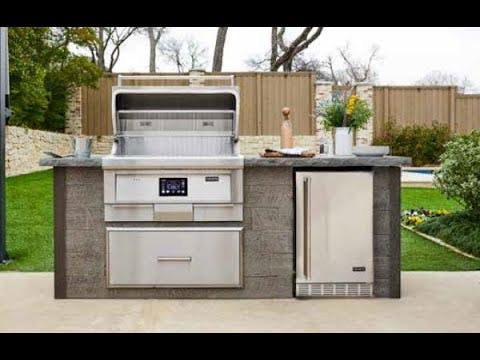 coyote pellet grill in outdoor kitchen