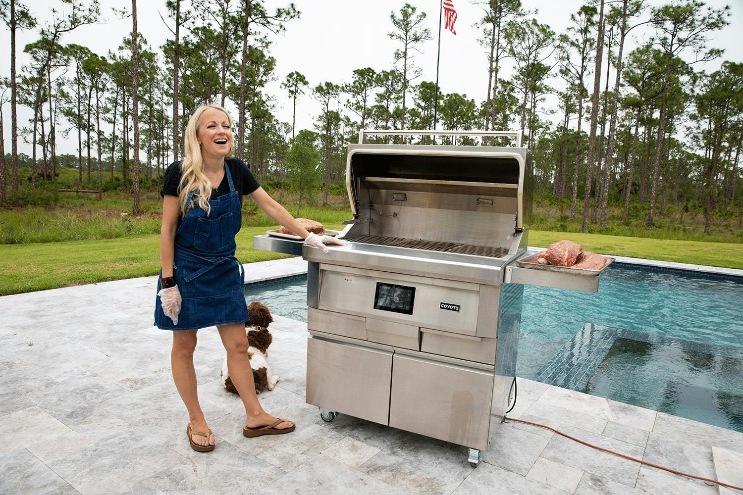 grill girl Robin with coyote pellet grill