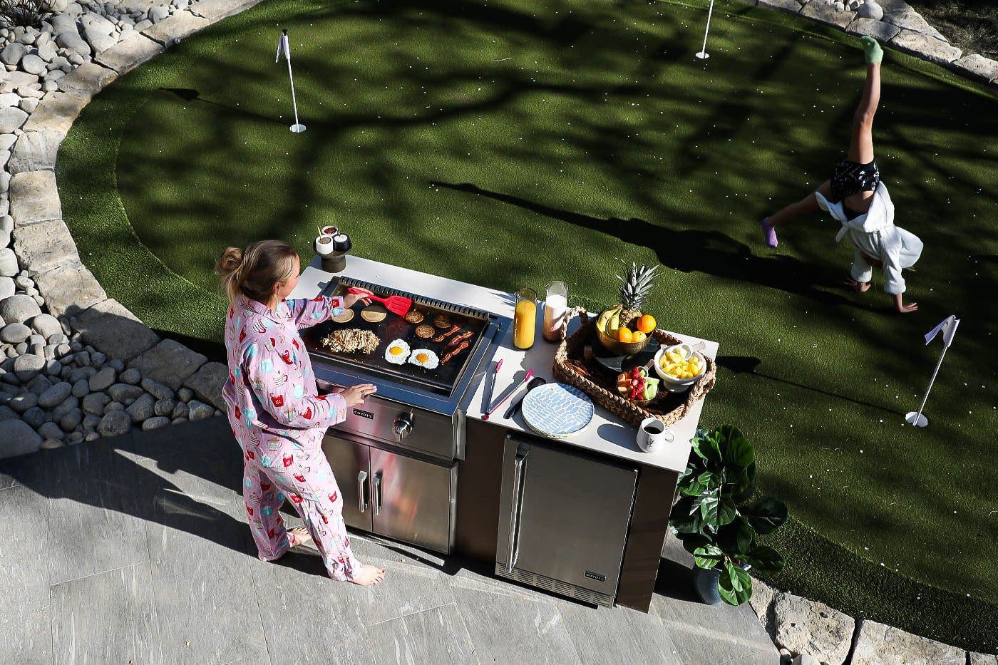 woman cooking on coyote island