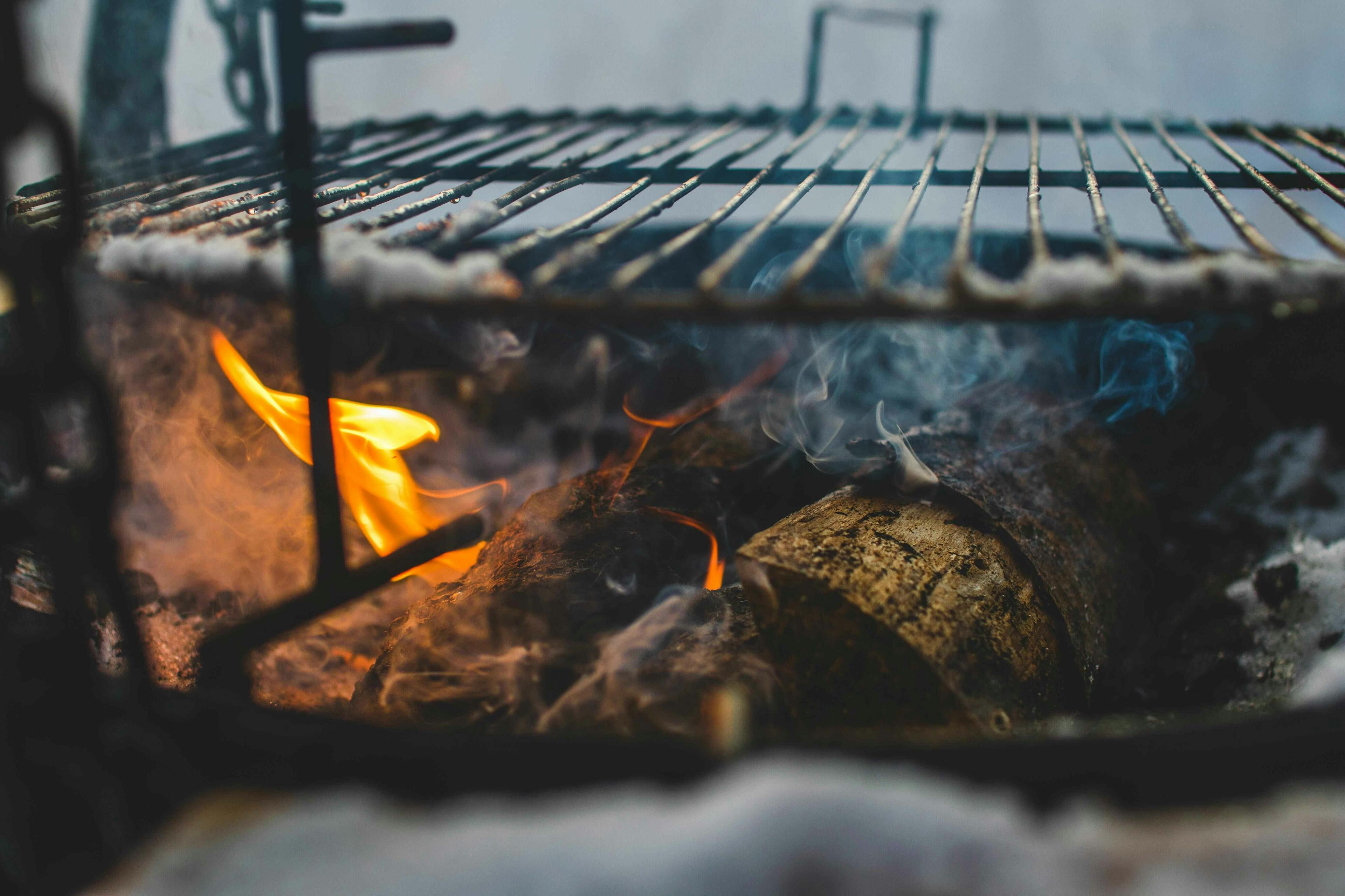 wood on fire in grill