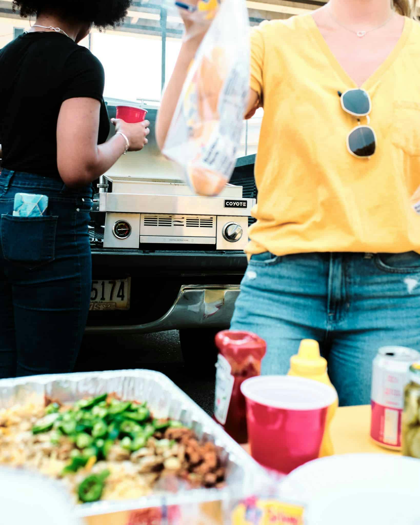 portable coyote grill being used
