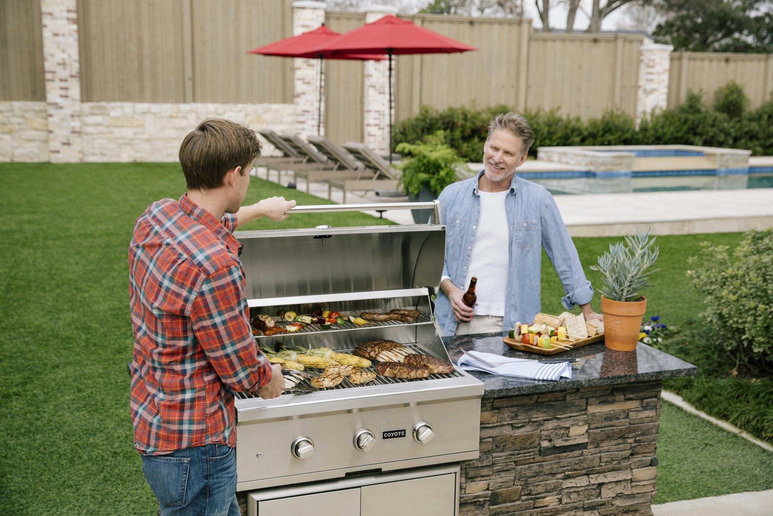meat and veggies on coyote grill