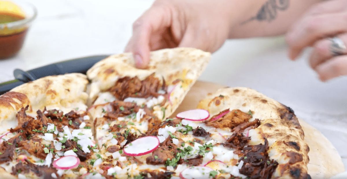 Birria pizza made by Coyote Outdoor