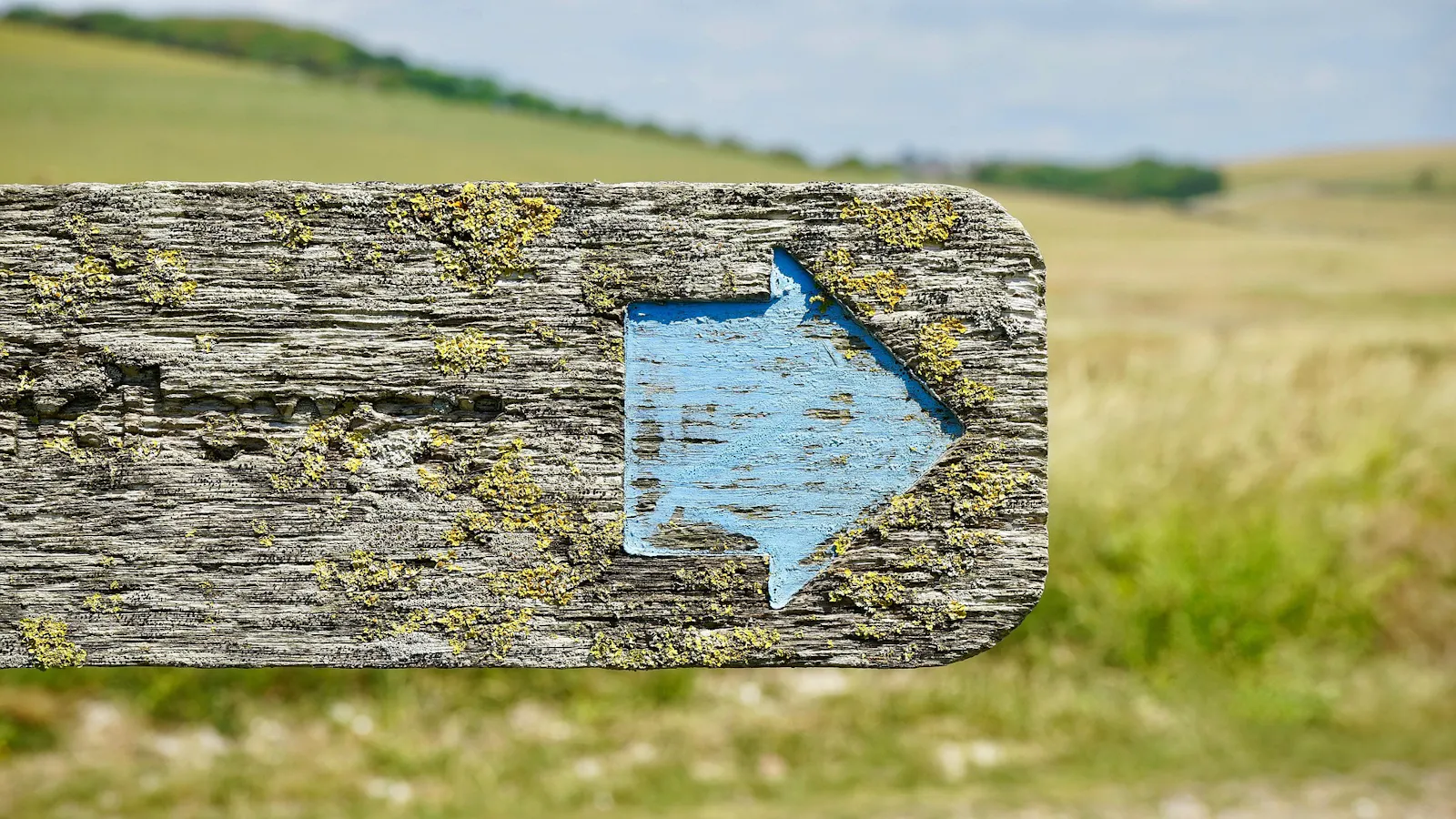 Sign with arrow pointing right