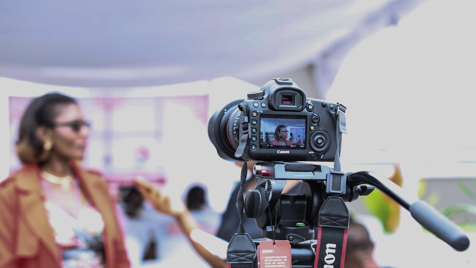 Camera recording a woman.