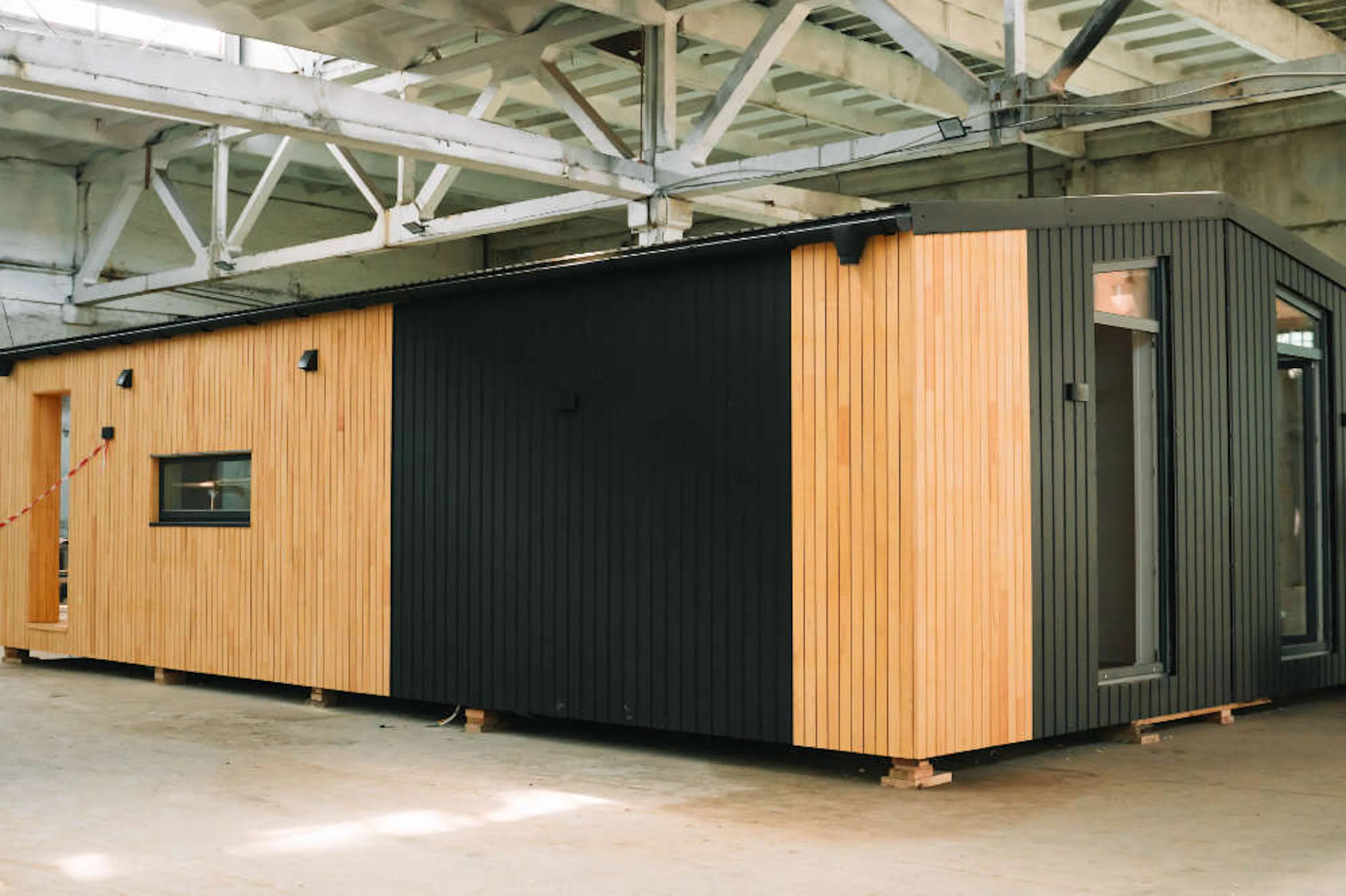 A modular home box sets in a manufacturing facility