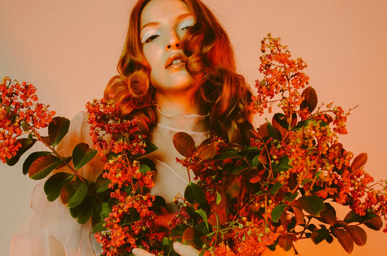Lady with autumn leaves