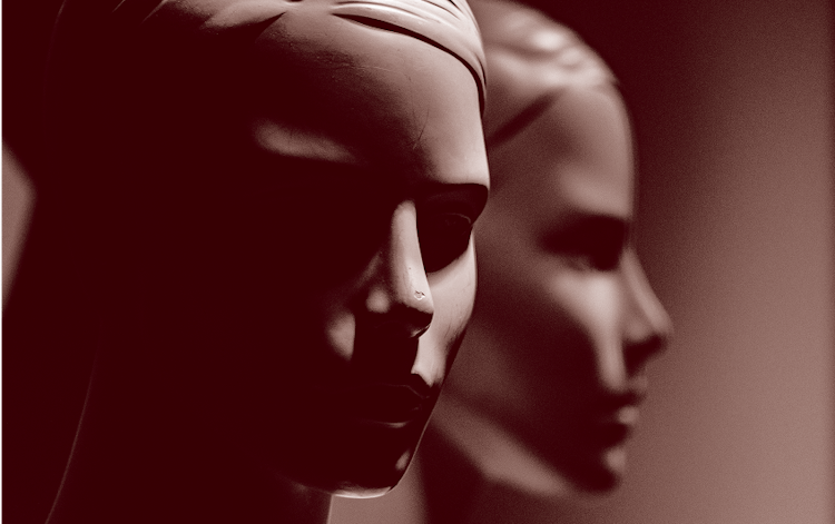 Faded doll faces