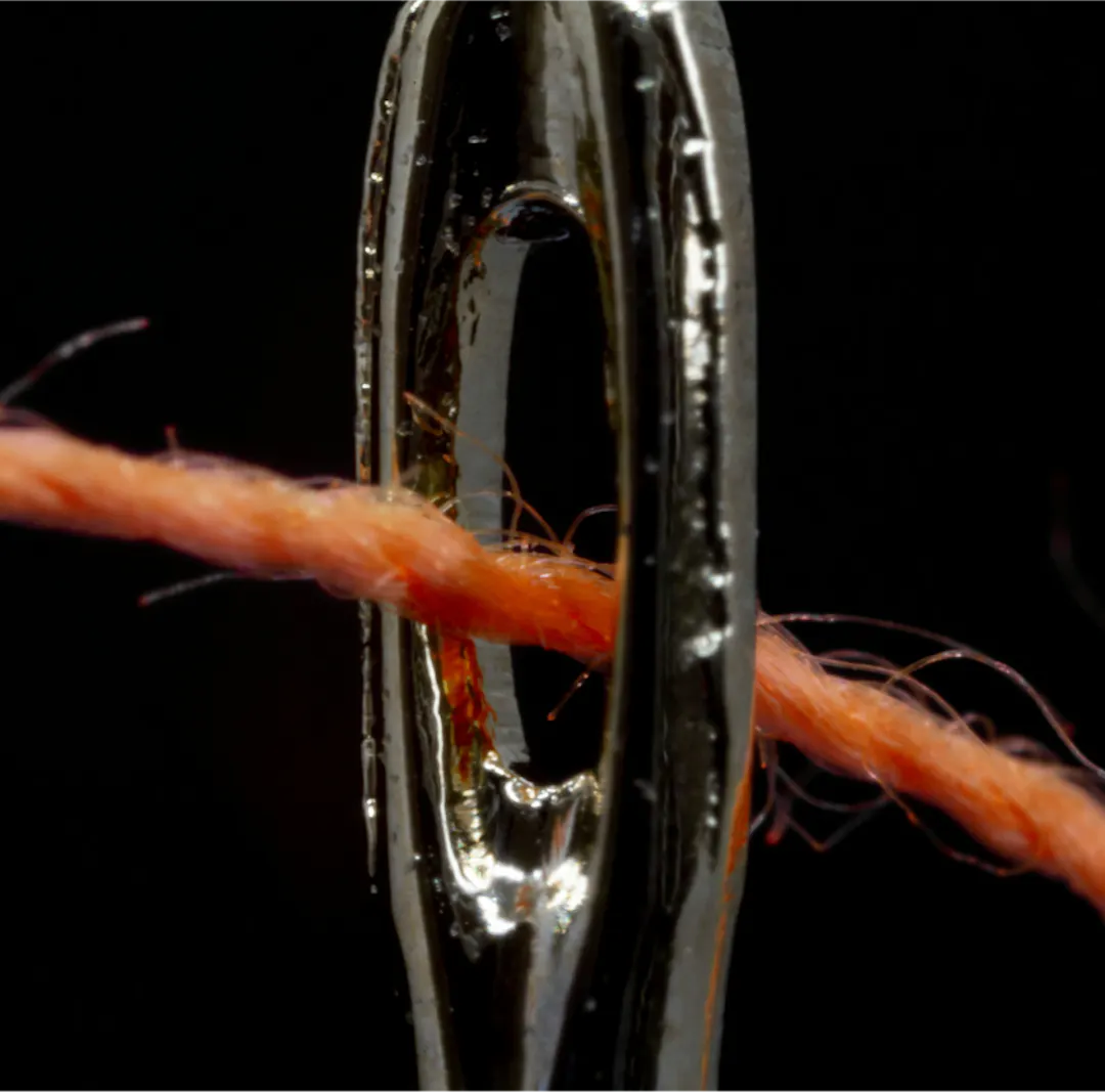 Thread in eye of needle