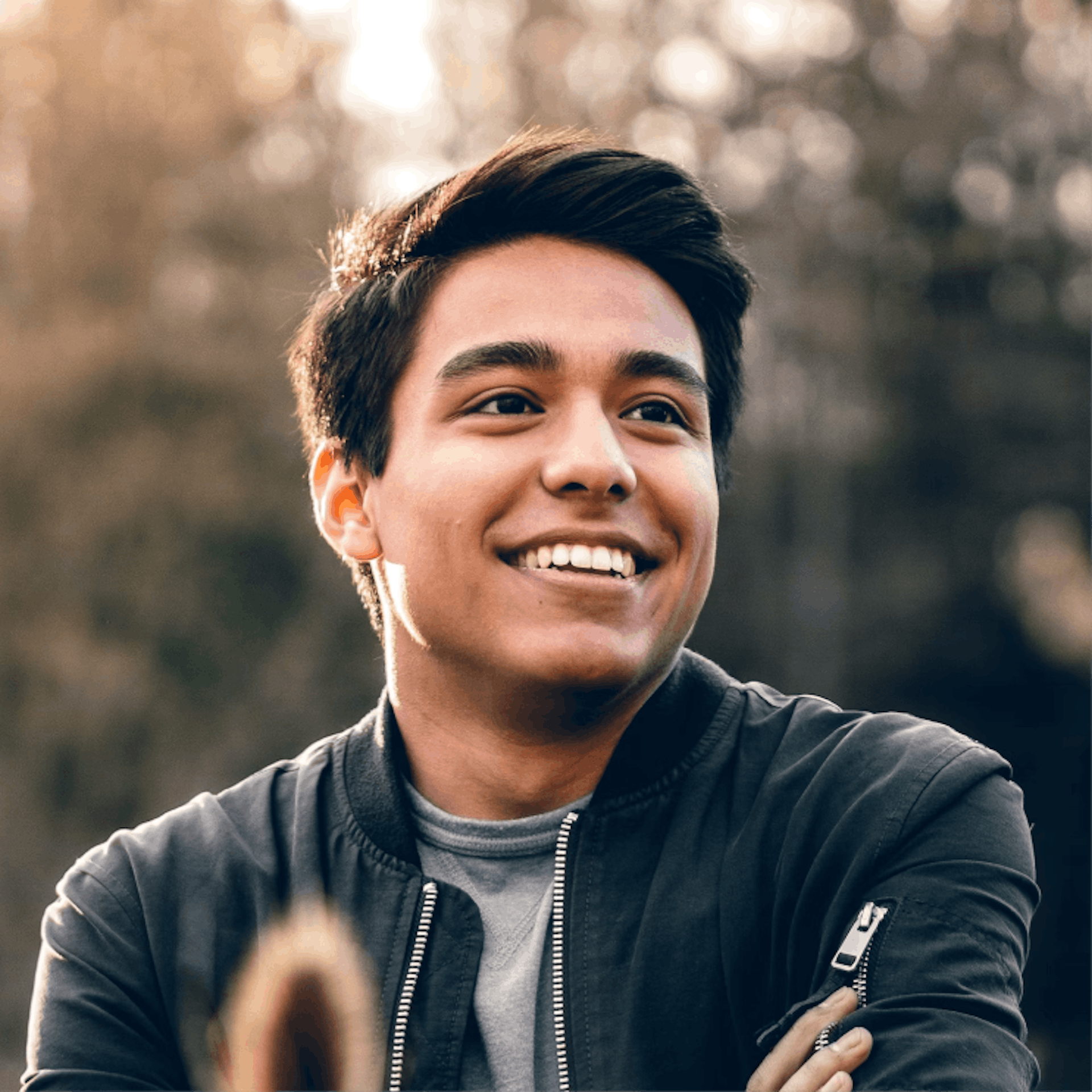 Portrait of Andy wearing a cool jacket outdoors