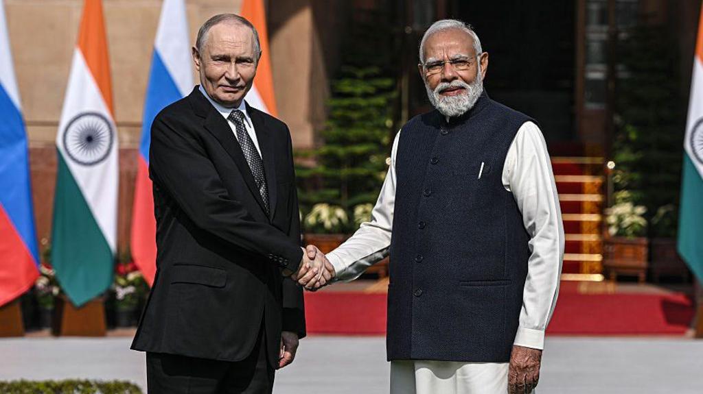 Putin and Modi to speak to media as leaders hold talks in India