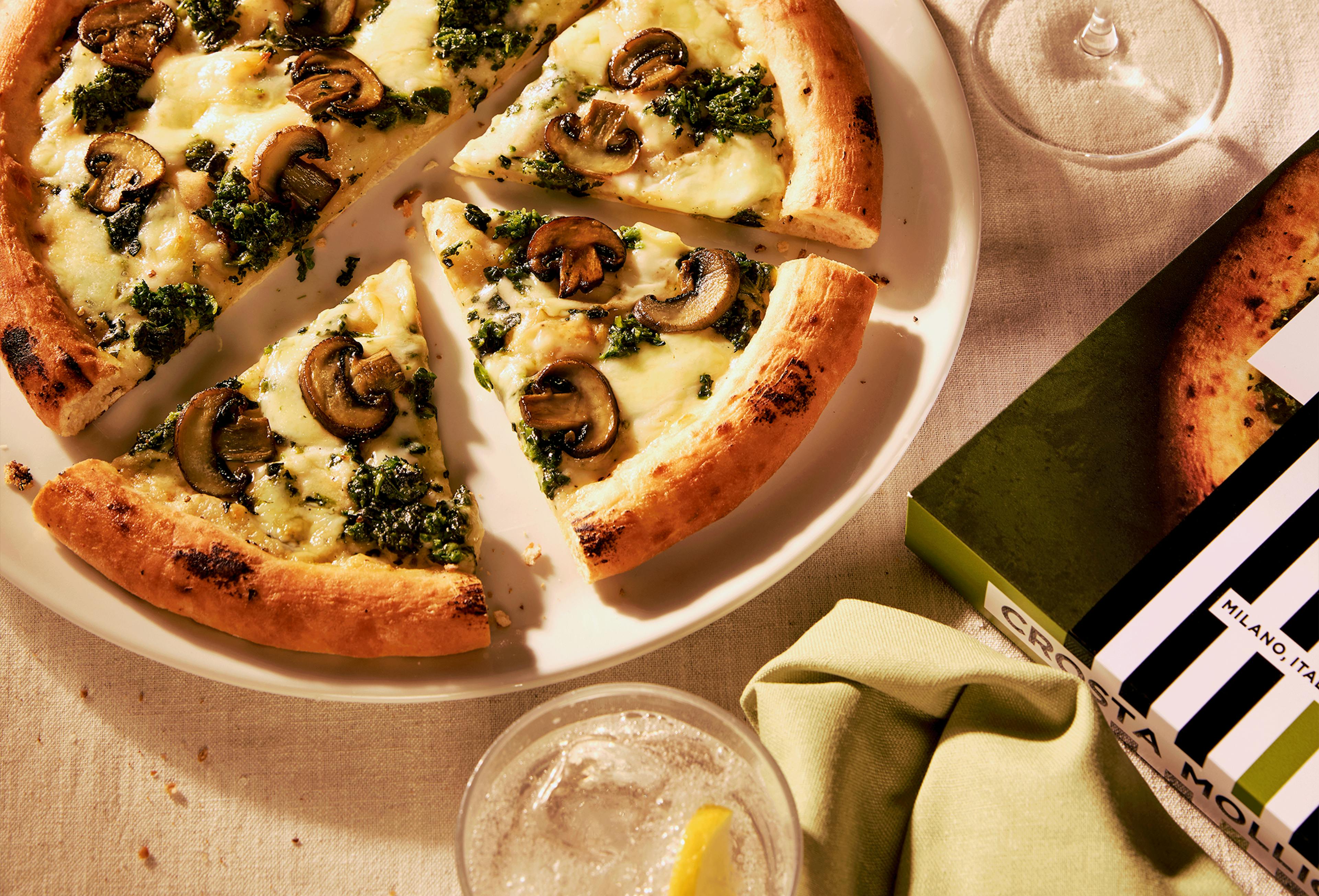 Crosta Mollica Fiorentina Pizza on a table with its packing. Pizza made in Italy.