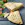 Two charred slices of Piadina Emiliana, a bite has been taken out of the corner of one.