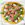 A close up of a Piadina pizza topped with Pesto, Prosciutto & Goats Cheese