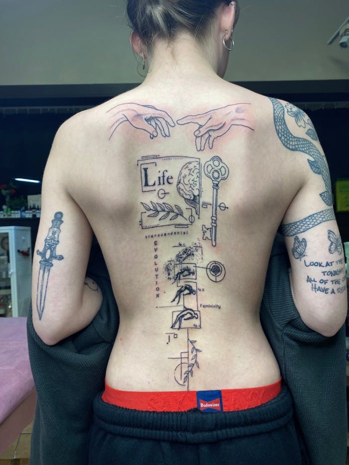 Tattoo of a large mixed diagram of life.