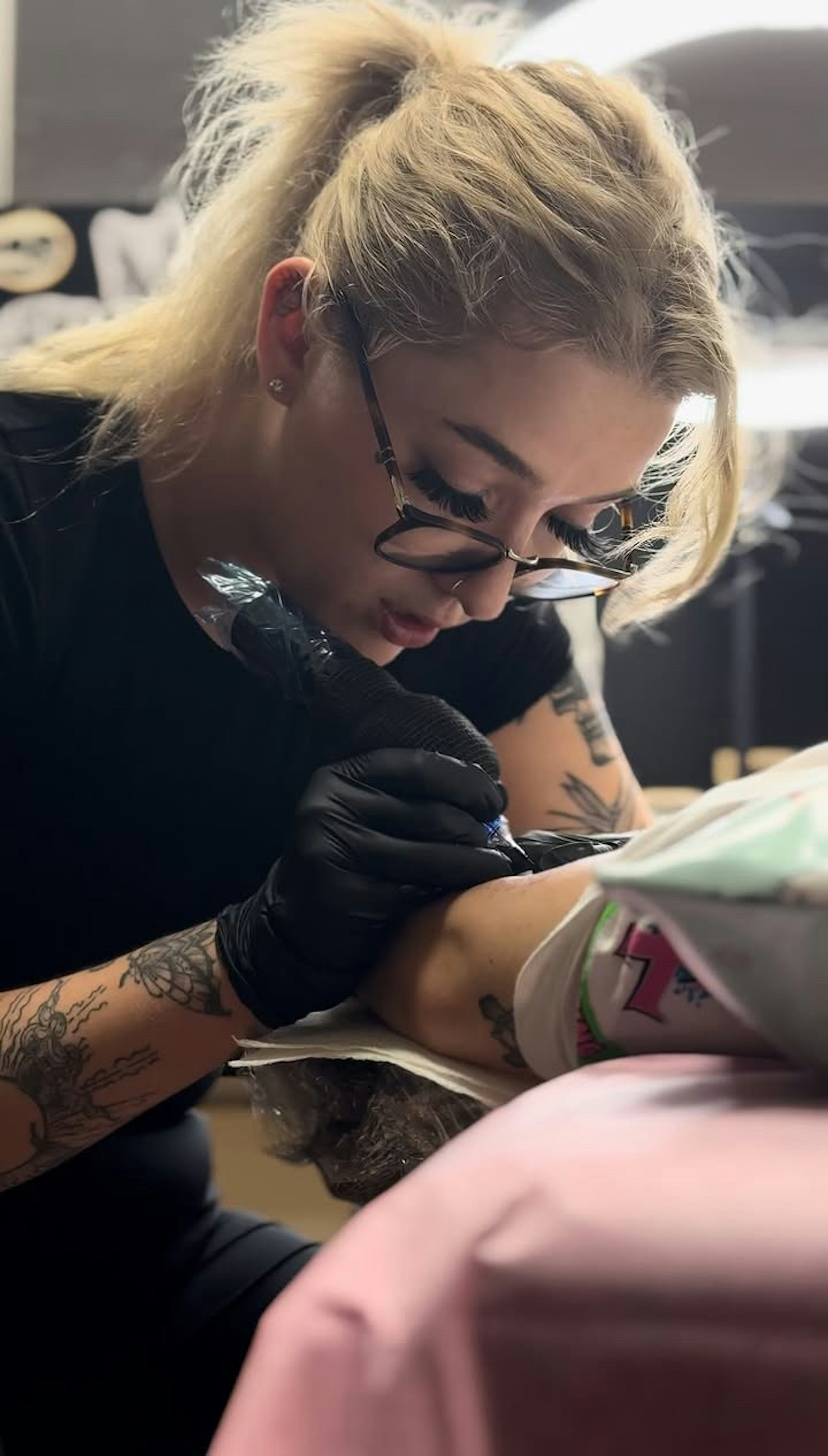 Photo of Meadow working on a client.
