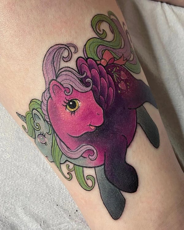 Tattoo of a two-headed My Little Pony conjoined twin.s
