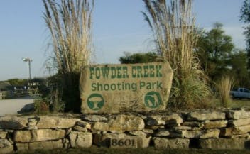 Entrance sign at Powder Creek shooting park