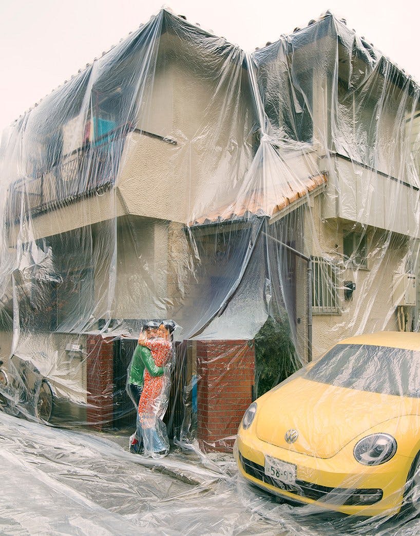 Photographer Hal vacuum-seals families together with their homes.