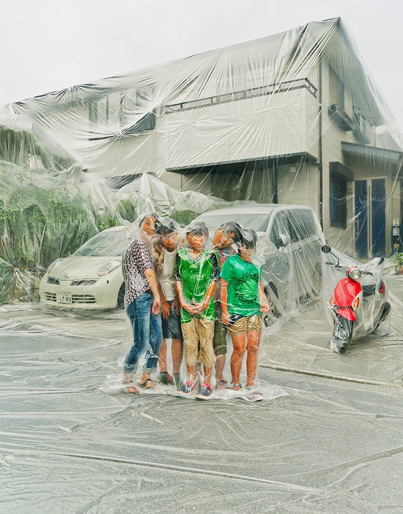 Photographer Hal vacuum-seals families together with their homes.