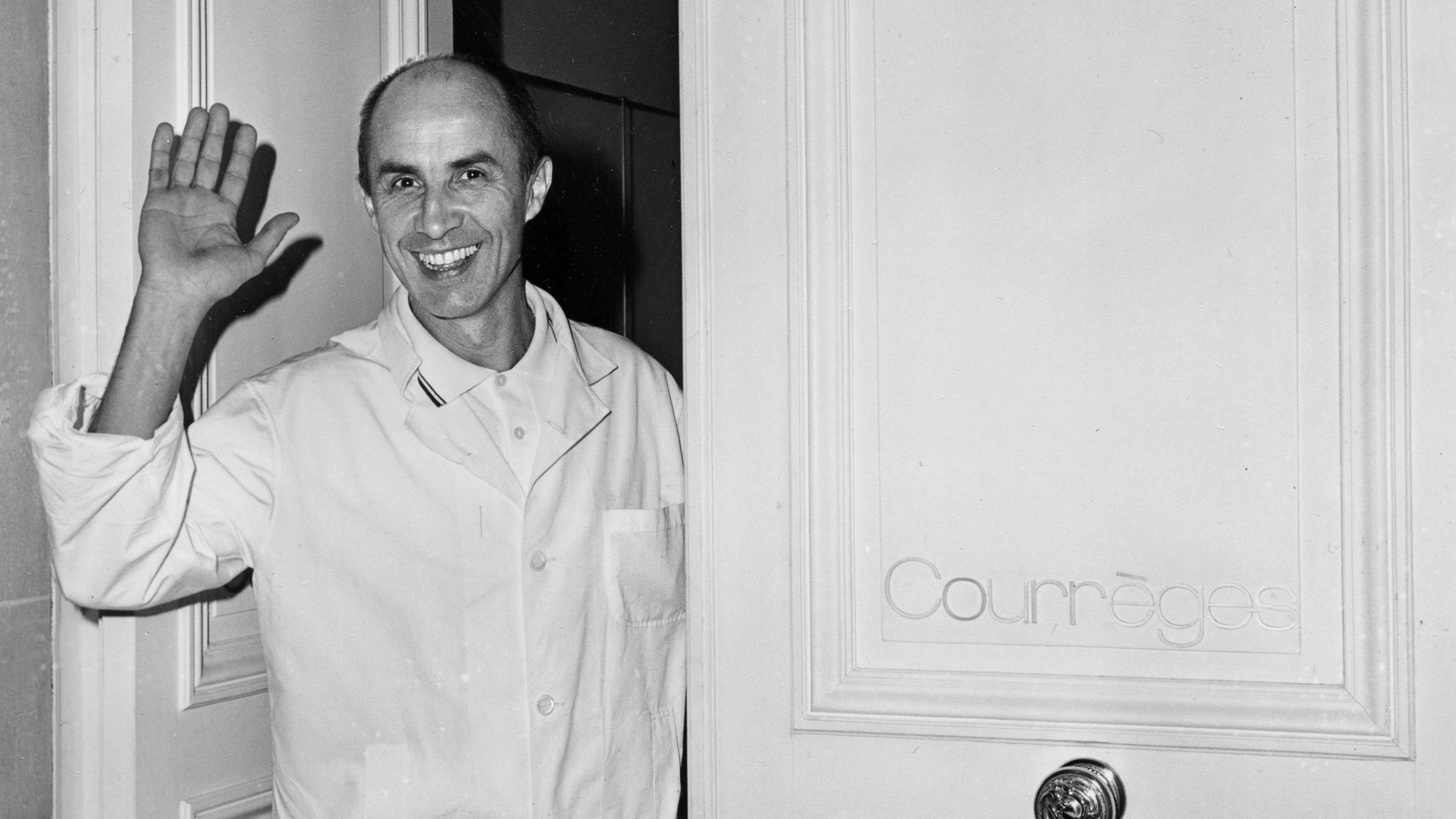 designer andre courreges at the door of his fashion house