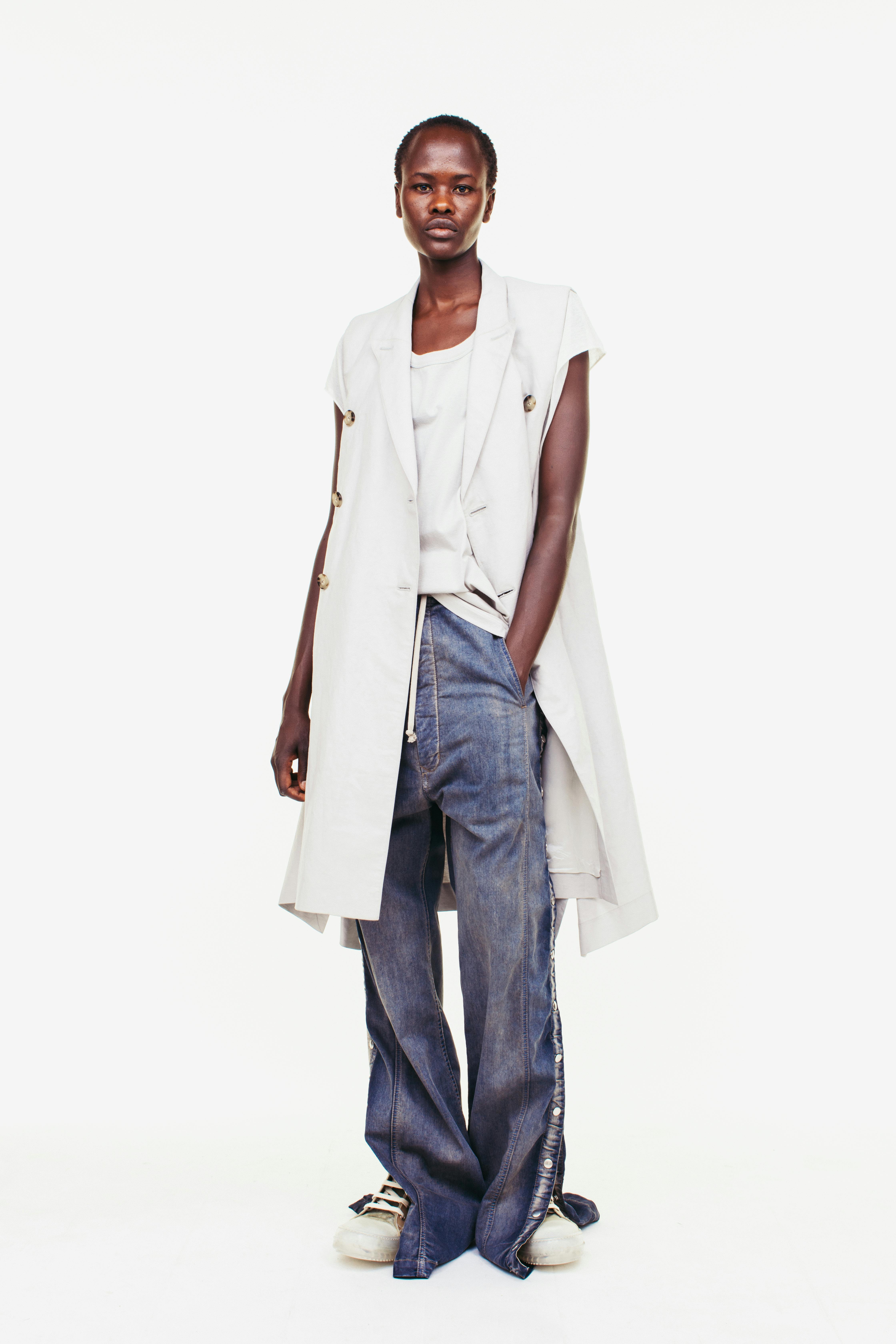 Rick Owens Campaign Sleeveless Double Breasted Coat in White Loose Fit Shirt in White Denim Drawstring Loose Fit Side Snap Trousers Transparent Ramones 	Womens SS19 Pre Collection