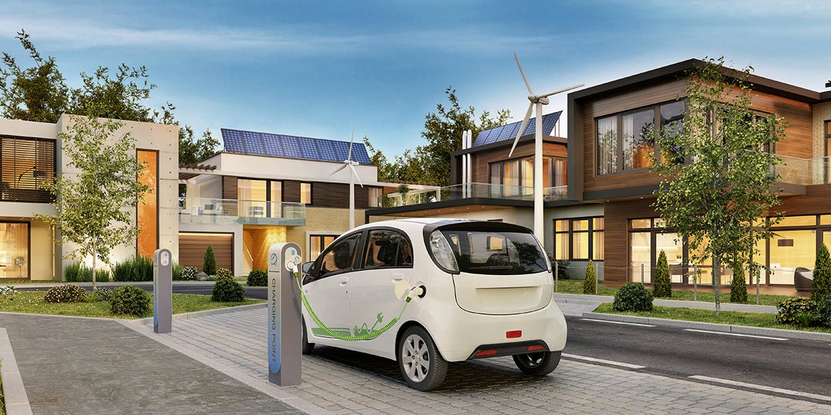 Aufladen von Elektroautos in einem umweltfreundlichen Wohngebiet
