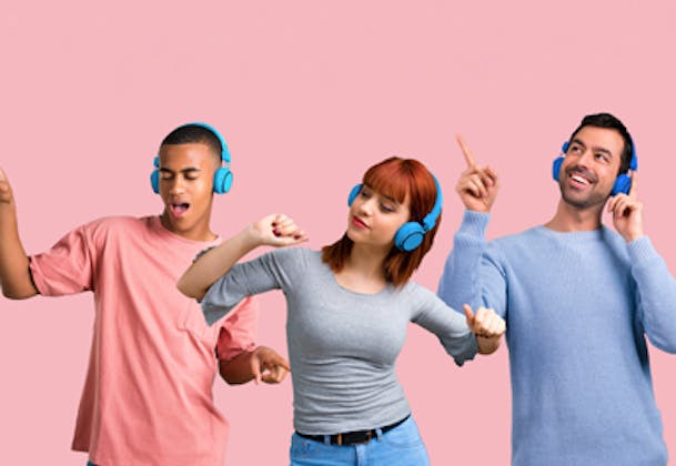 Young people listening to music with headphones
