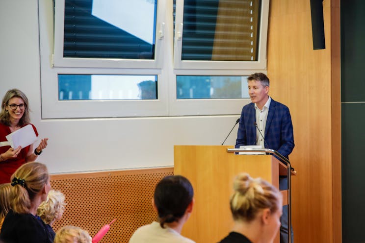 Alexandre Pauchard, CEO, CSEM, stood on a podium giving a speech