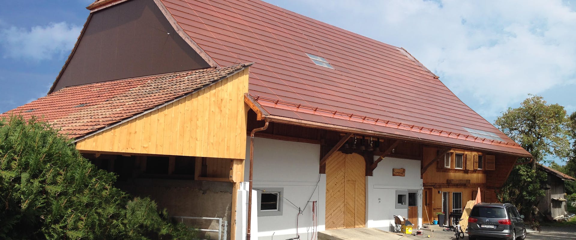 These terracotta-colored tiles are photovoltaic.