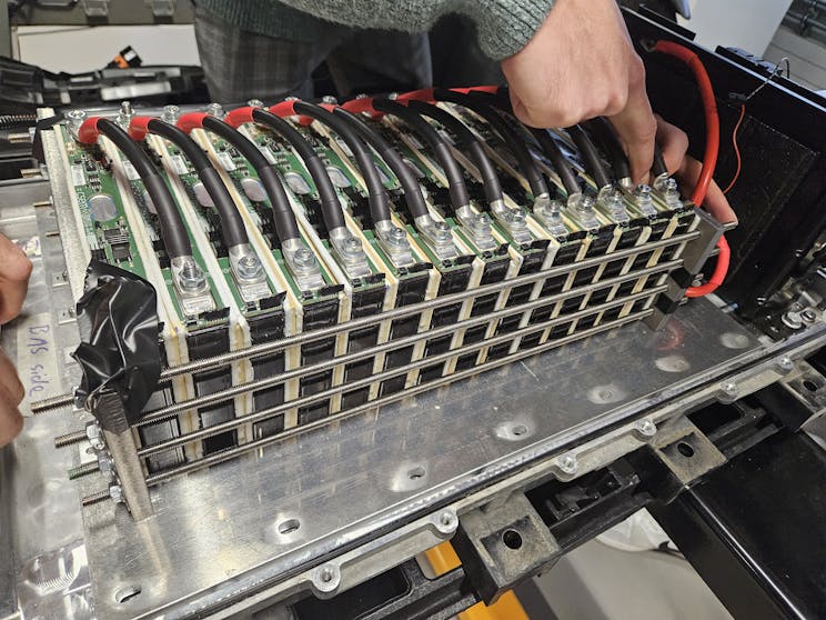 An expert working on one of the Battery Management Systems developed at the CSEM Battery Innovation Hub.