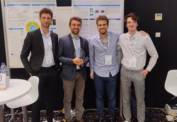 Martin Perez Chuecos, Battery BMS Software Architect & Developer; Pietro Iurilli; Leon Locher, BIH collaborator; and Colin Bocquillon, Battery BMS Hardware Developer, standing in front of a scientific poster.