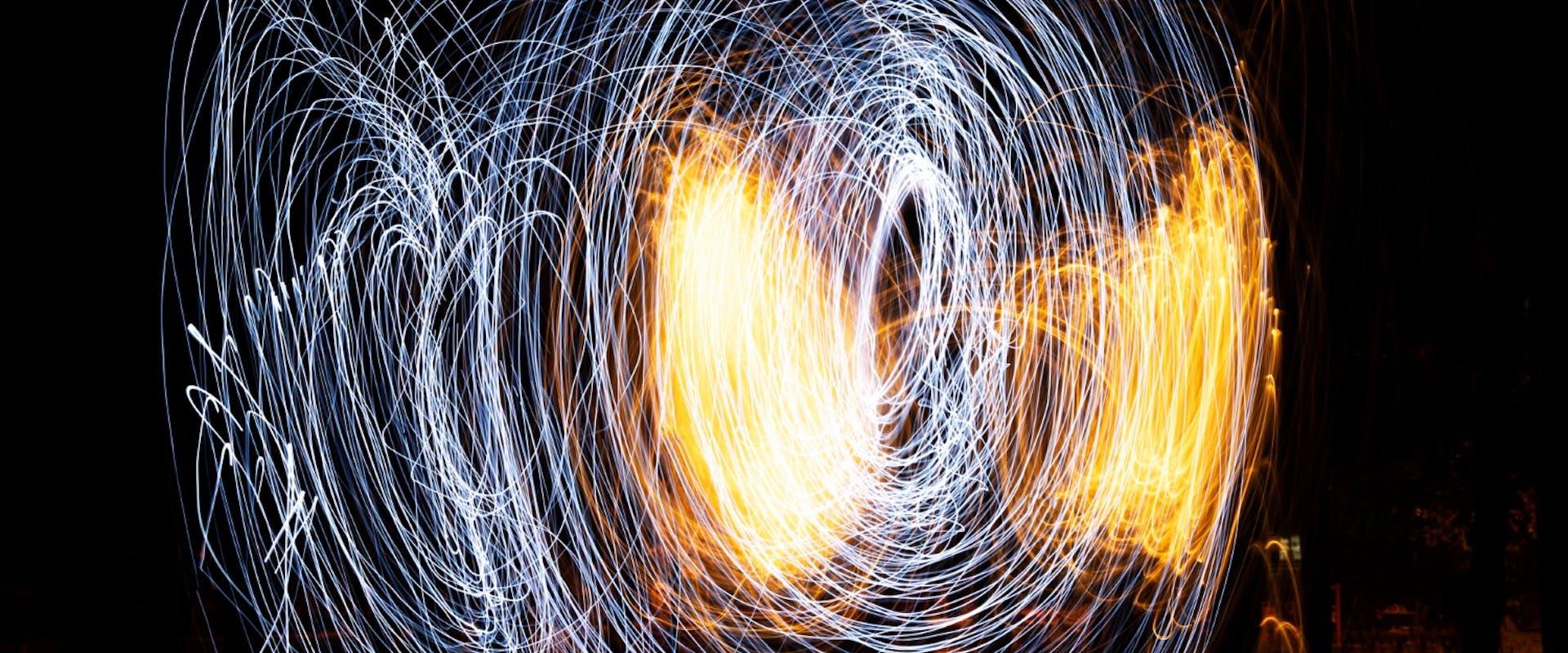 A dynamic light painting image in a circular formation denoting time and frequency waves.