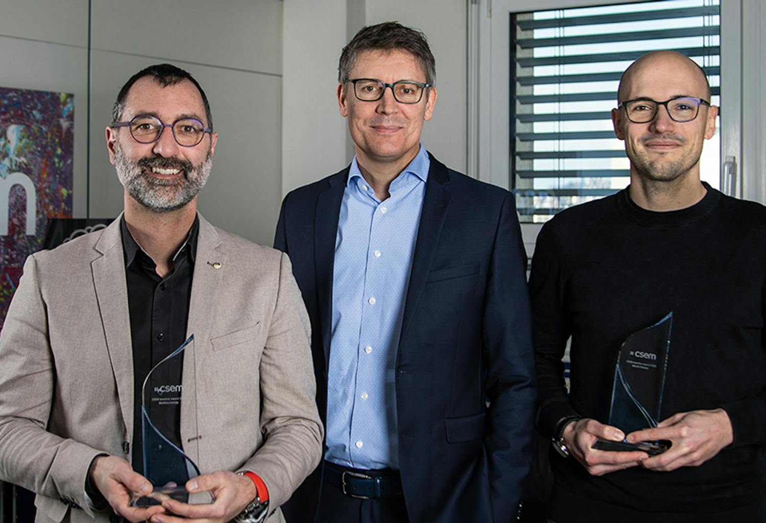 Winners of the Inventor Award 2023: Matthieu Lemay (left) and Martin Proença (right) - Alexandre Pauchard, CSEM CEO (middle)