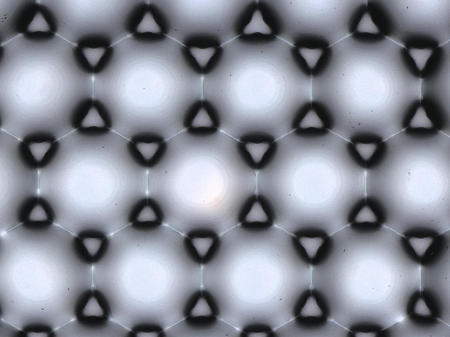 Hexagonal array of nearly gapless MLA with 23 µm pitch.