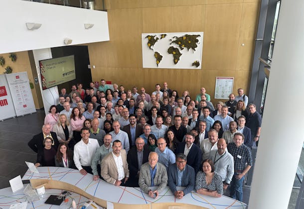 Group of multiple people standing together, who form the GENESIS kick-off team
