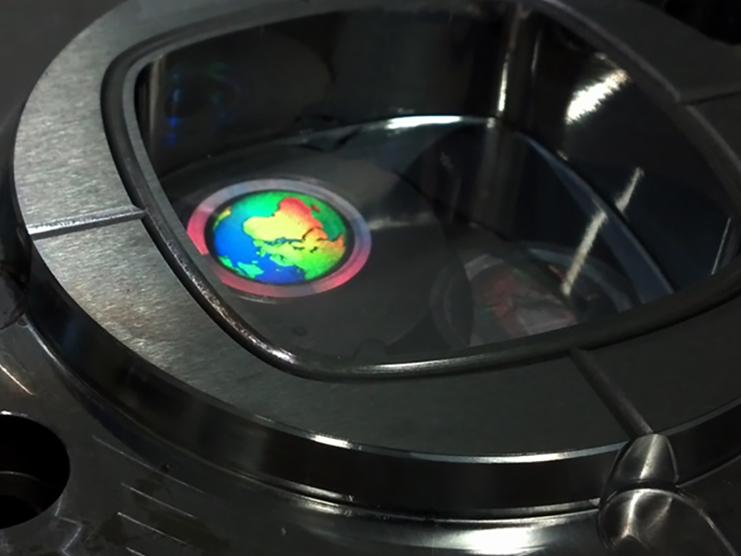 Steel insert for injection molding structured with a hologram