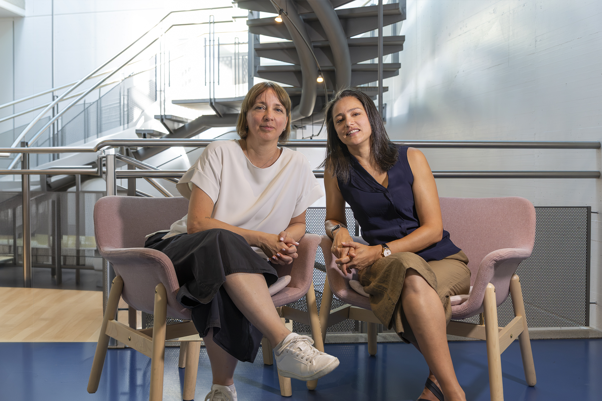 Samantha Paoletti (left) and Alia Lemkaddem (right), CSEM experts in female health, seated side by side indoors.