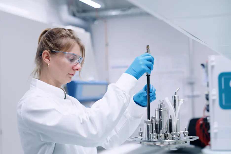Scientist handling Hamilton’s GlucoSense sensor during installation in a bioreactor for real-time glucose monitoring. Image courtesy of Hamilton Bonaduz AG.