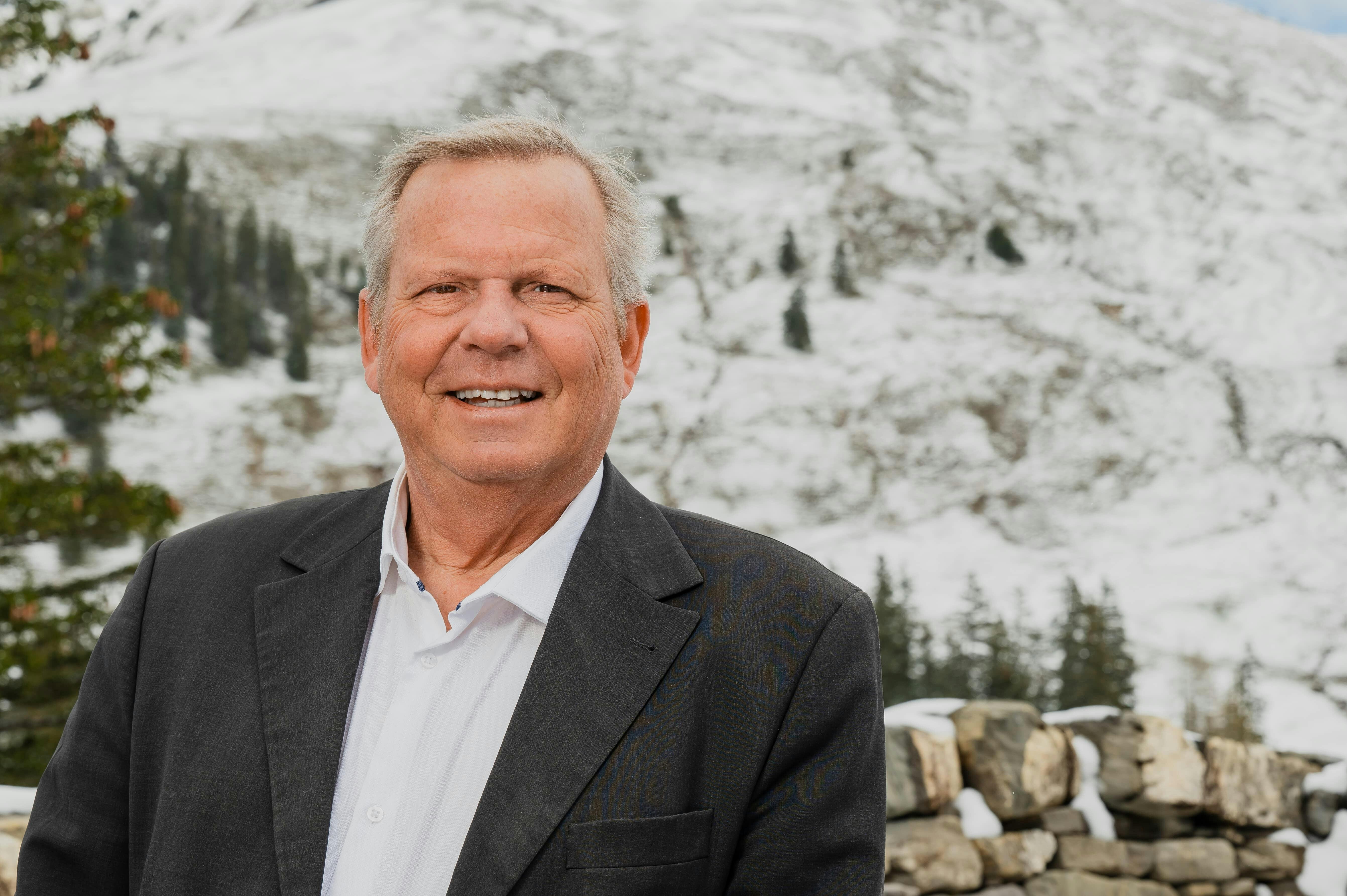 Philippe Steiert (CSEM's outgoing VP) standing in a suit smiling