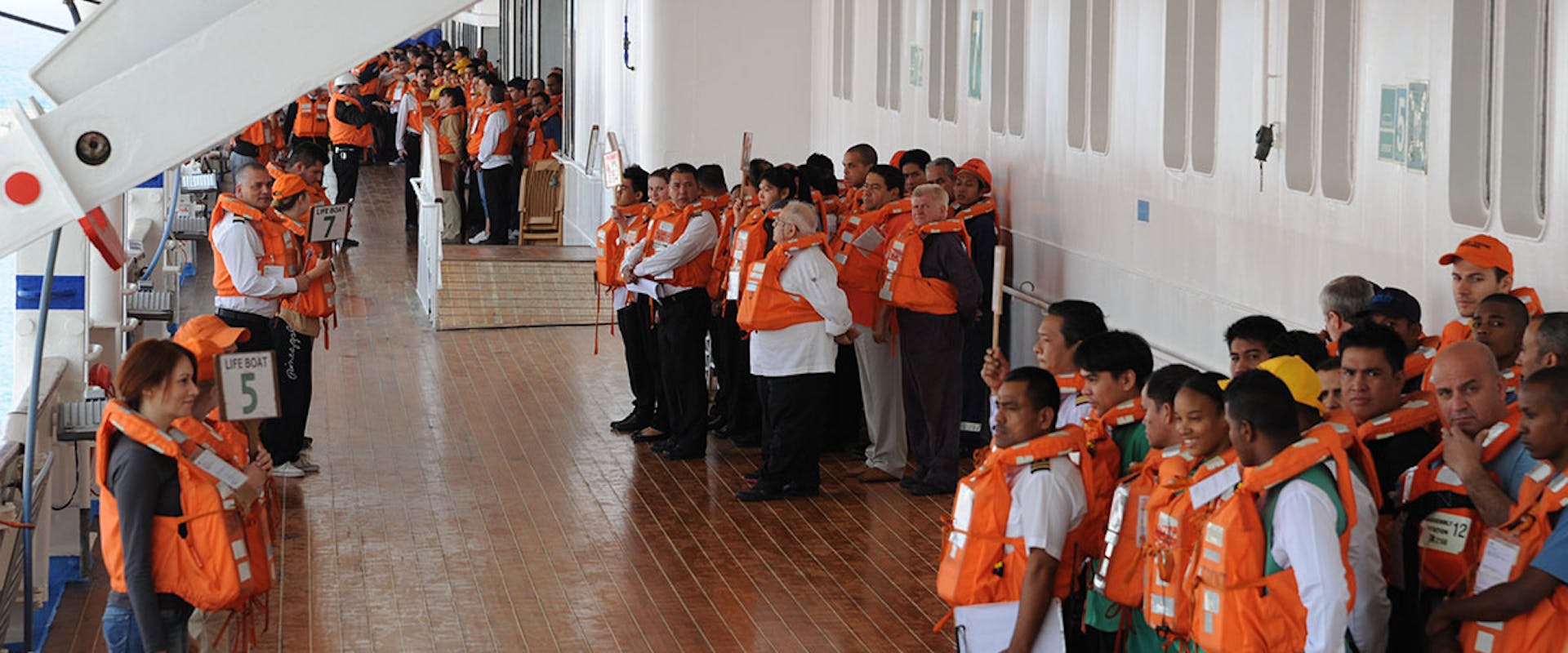 People on a boat with life vest