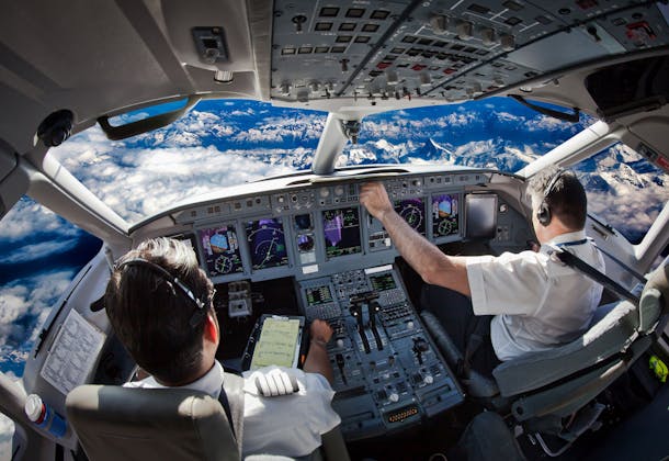 Two pilots in a plane cockpit