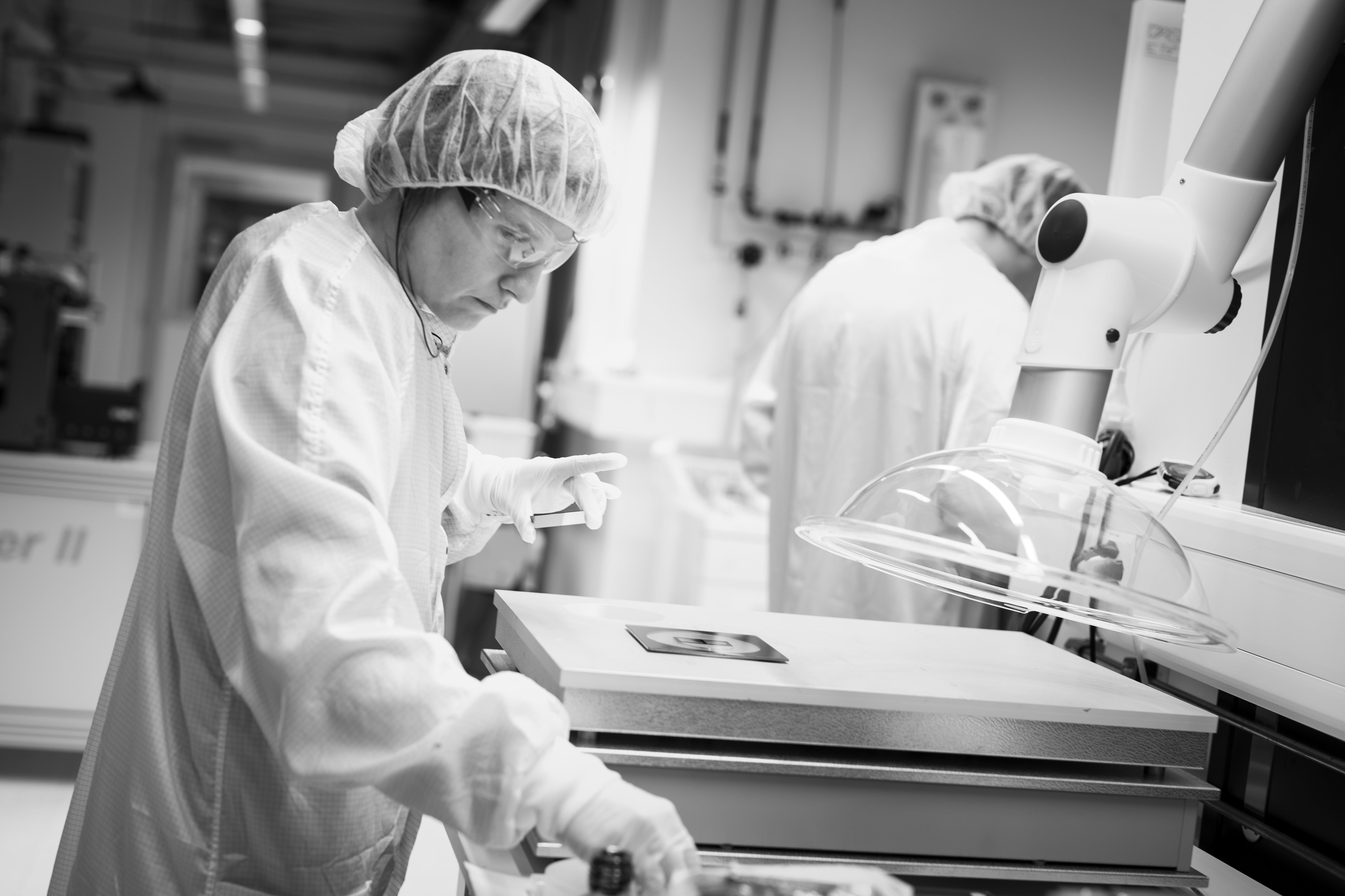 Lab scientist working in a clean room