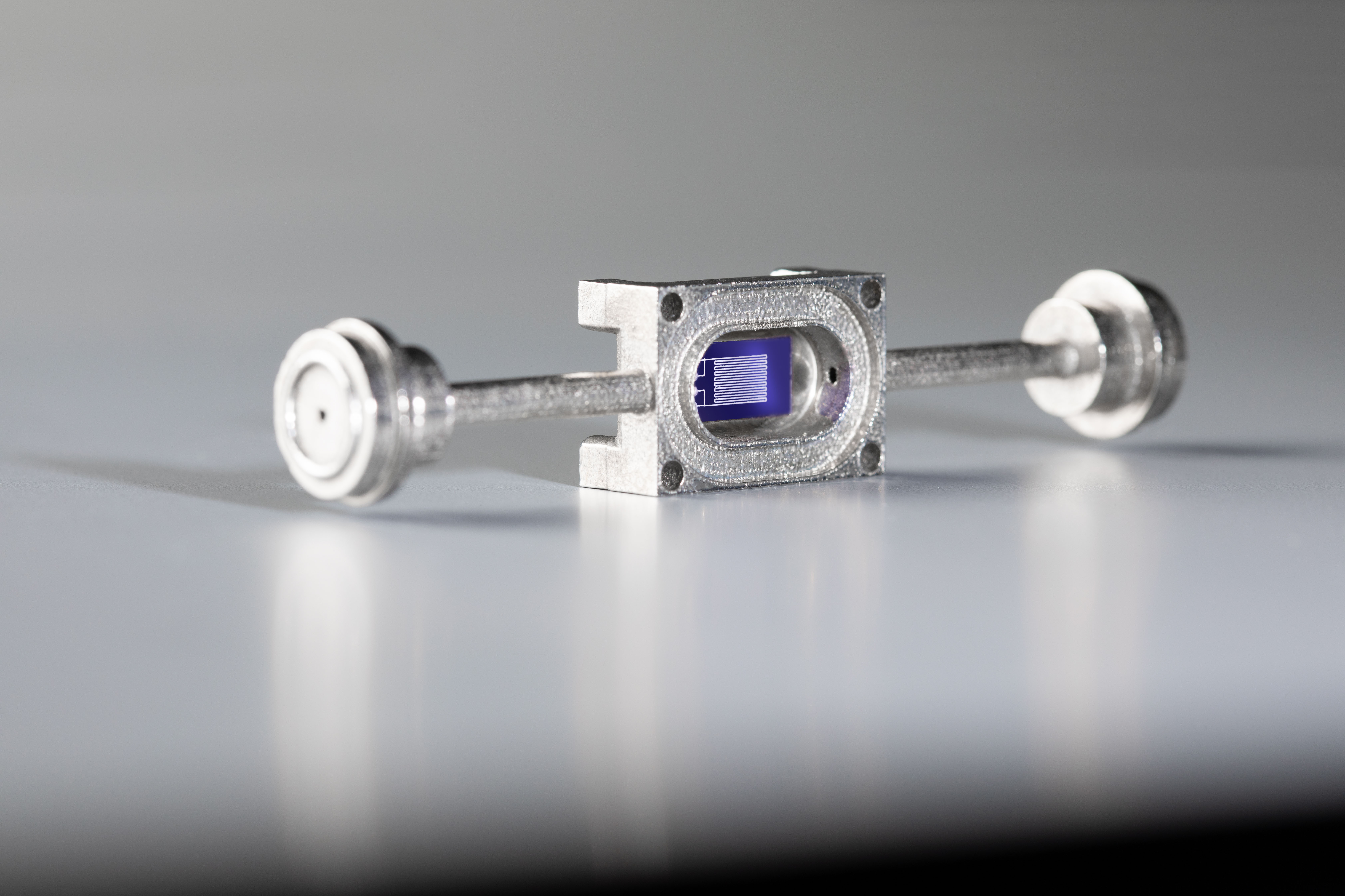 3D printed metal pipe featuring pressure fittings, electrical feedtrough and Aerosol Jet Printed temperature sensor.