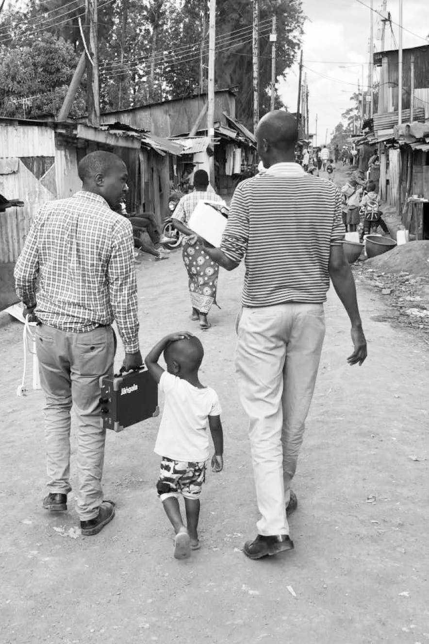 People carrying Jangala Big box in Kibagare