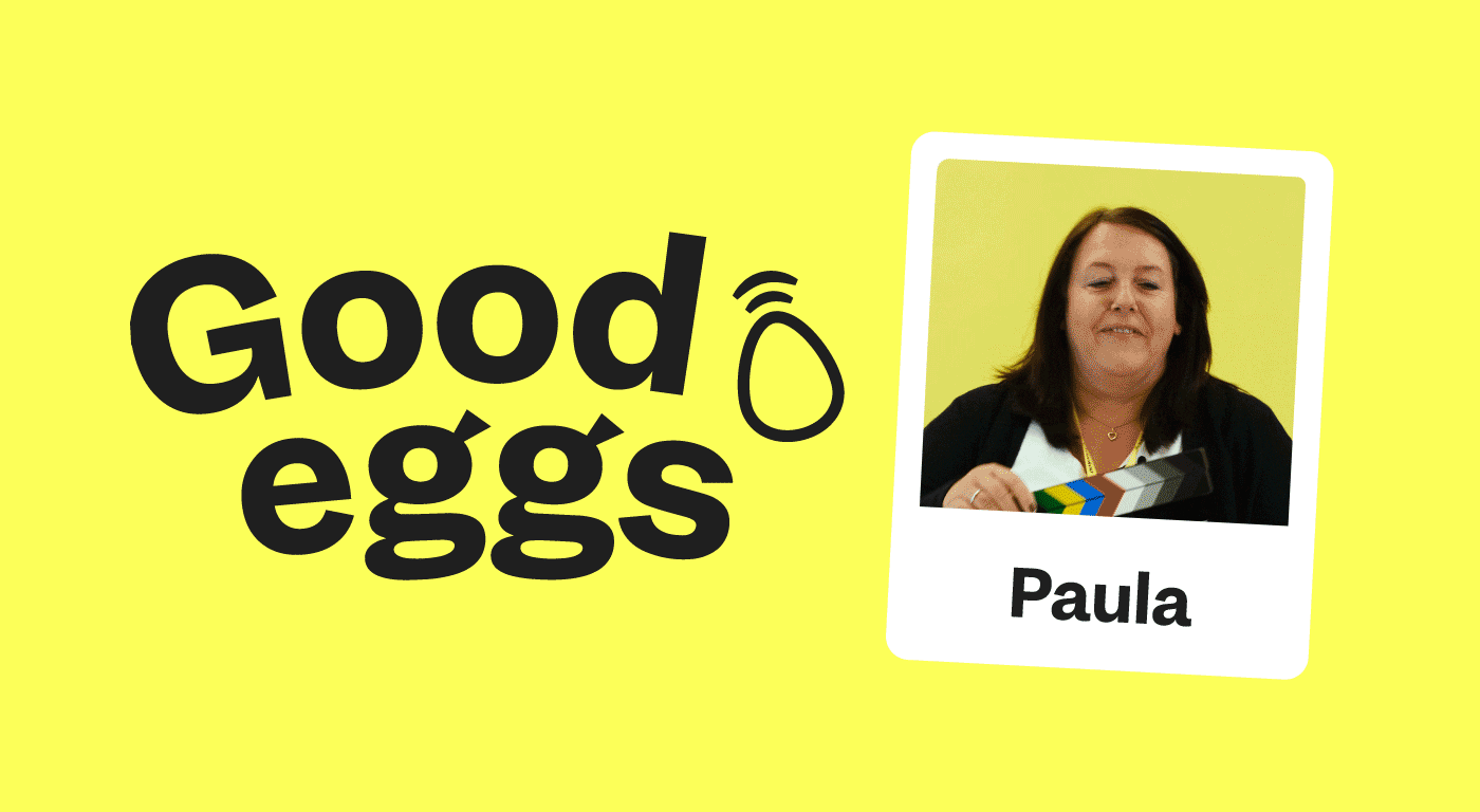 A lady claps a clapperboard next to text that reads "Good Eggs"