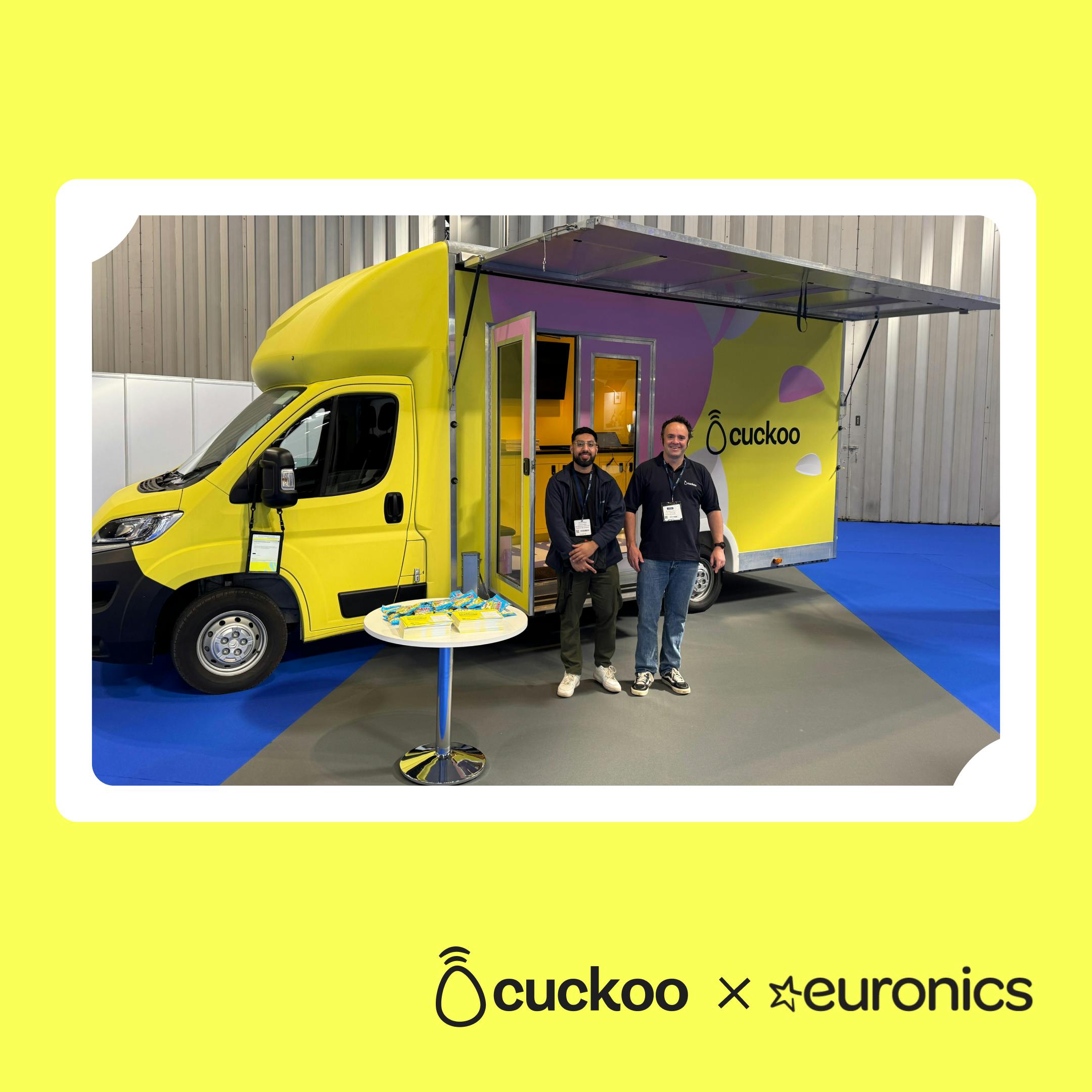 A yellow transit van branded in cuckoo broadband's colours