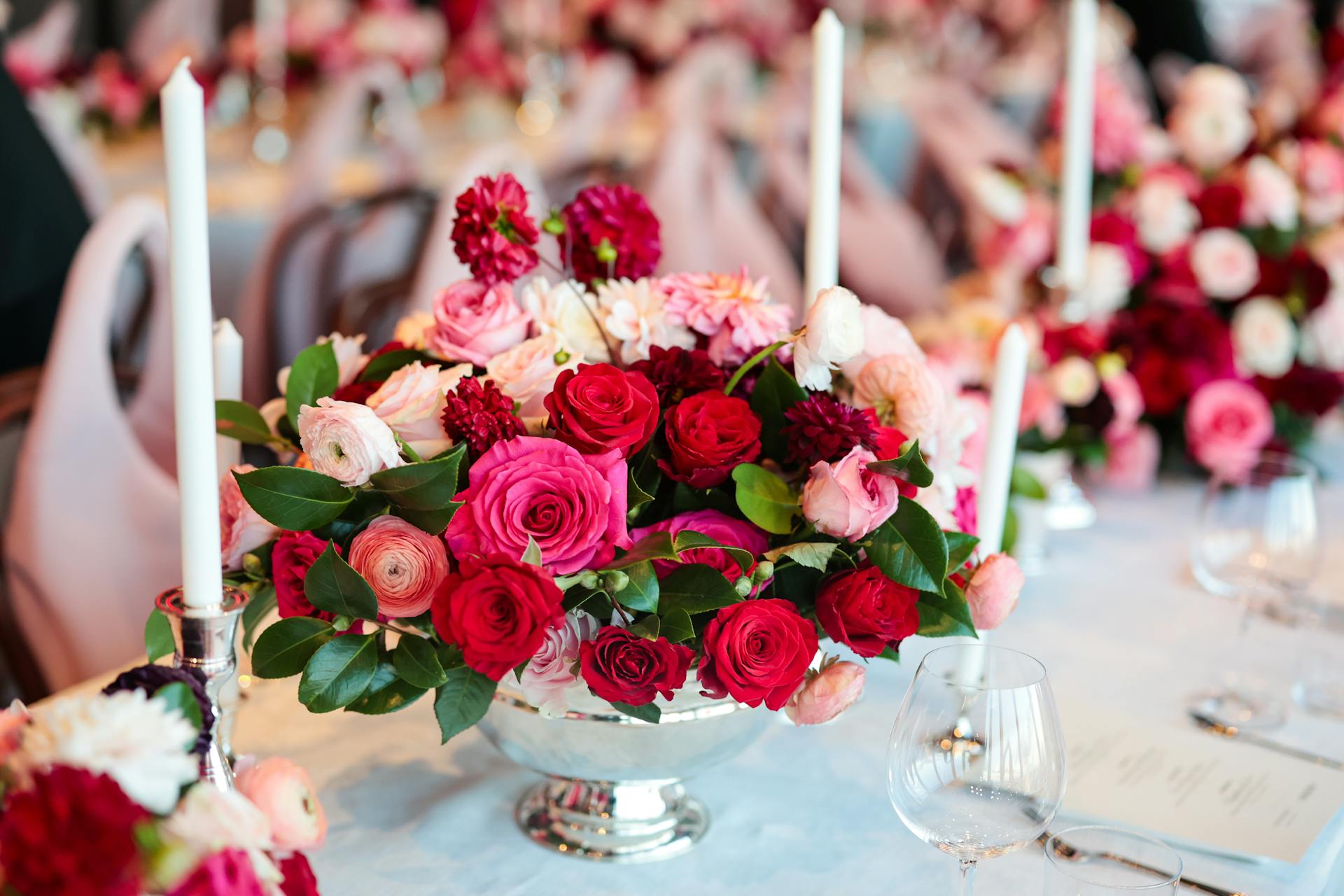 flowers and candles on a banquet table
