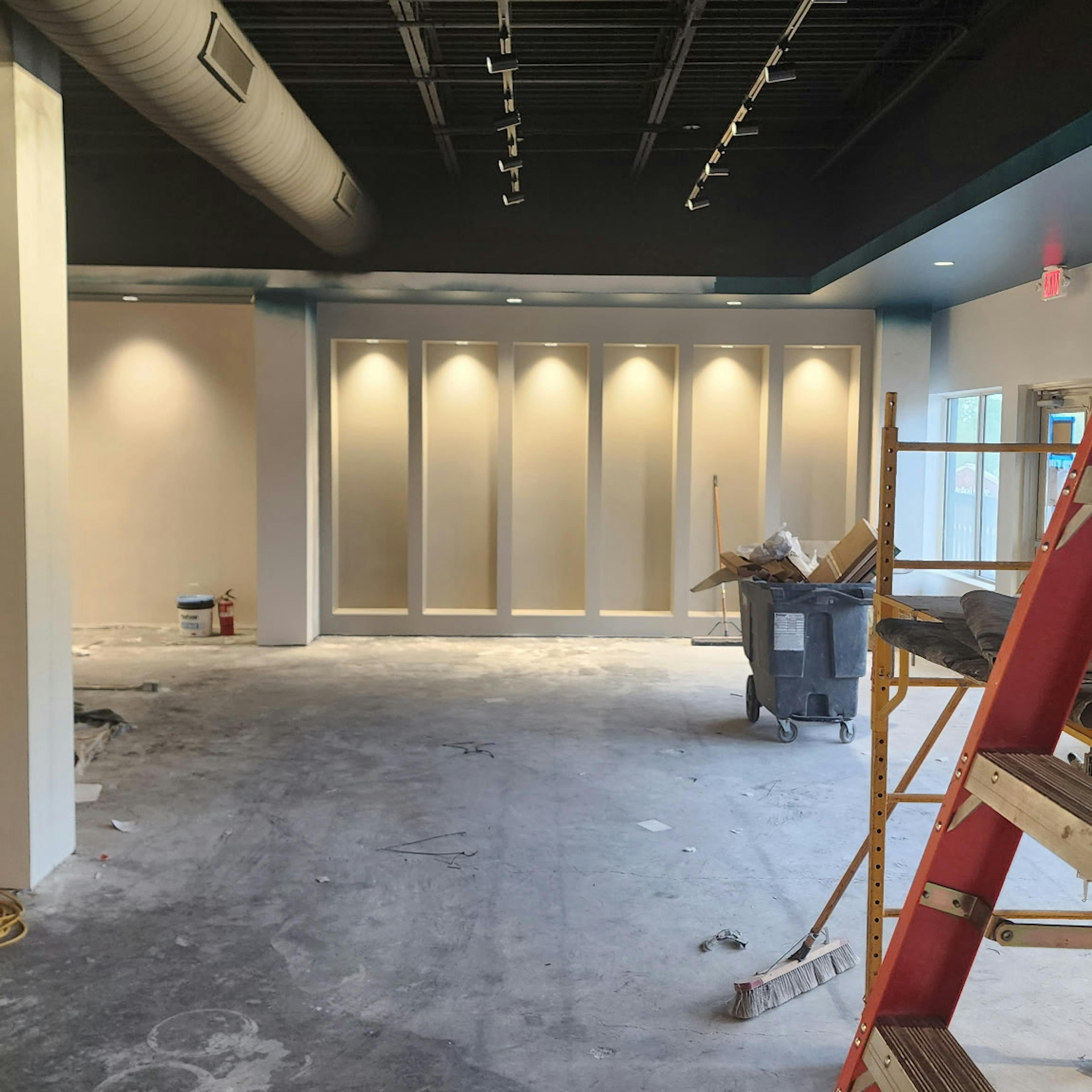 Empty room with shelves and lighting