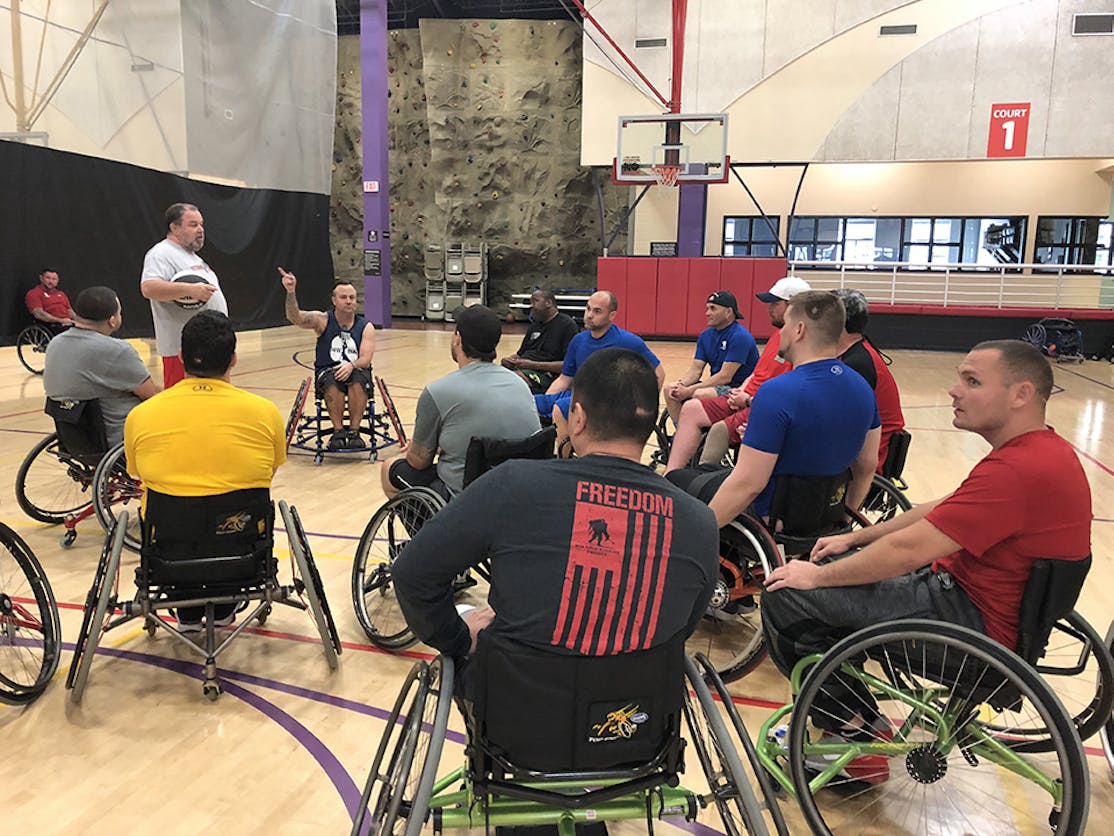wounded warrior team playing basketball